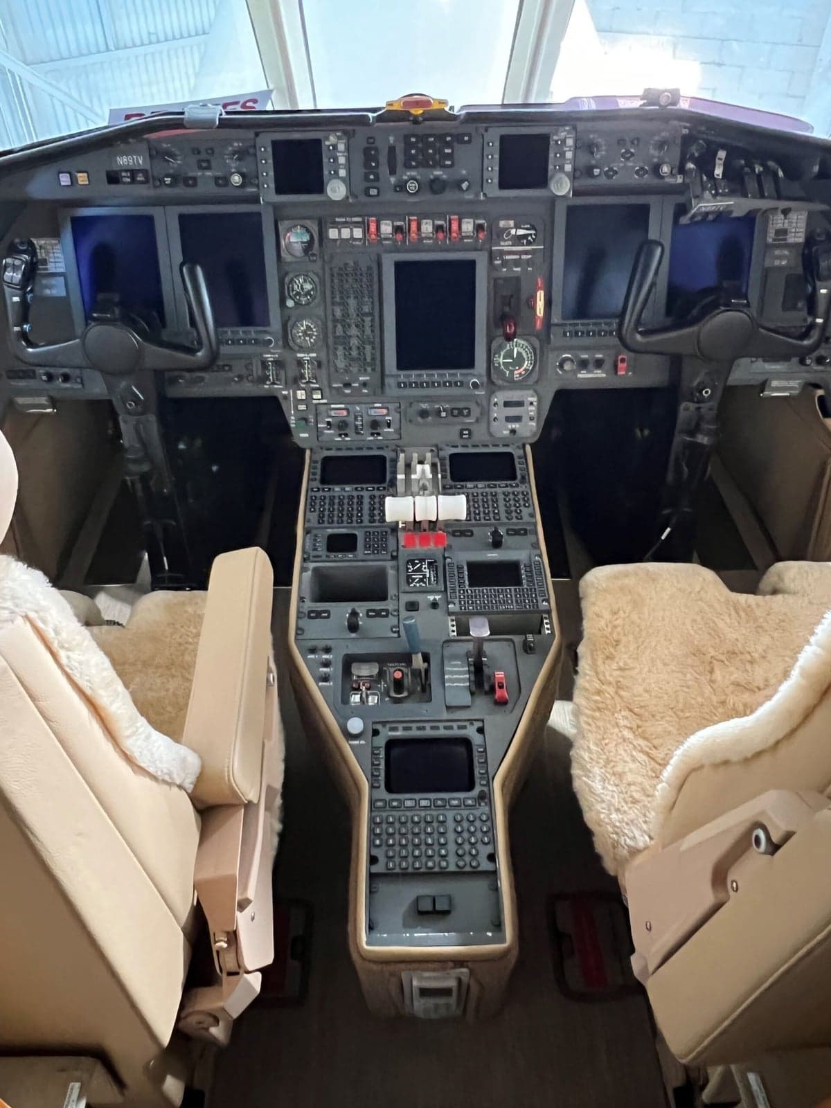 View of the cockpit of N89TV from the jump seat.