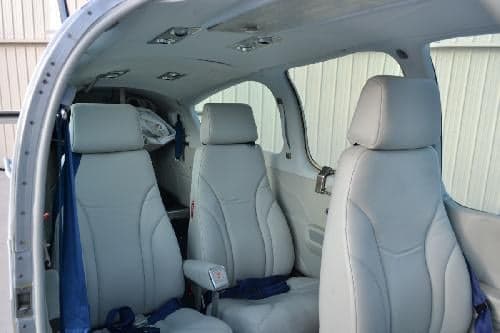 Interior view of the aircraft cabin showing the seats.