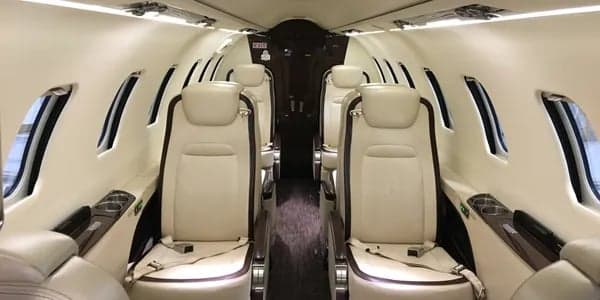 The interior of the aircraft shows the seating arrangement.