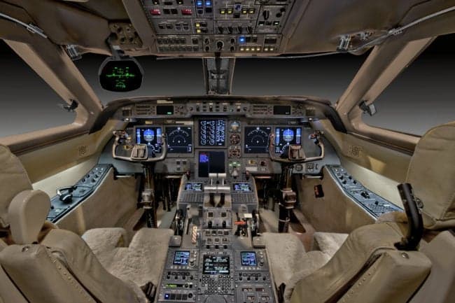 The aircraft's cockpit, showcasing the instrument panel and controls.