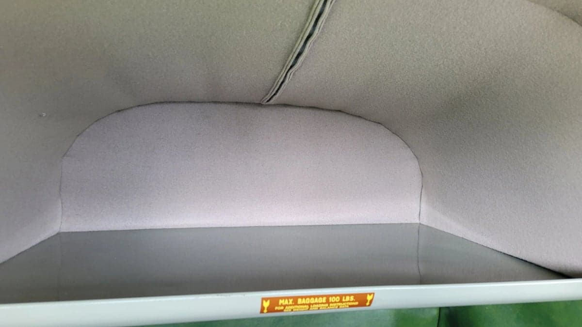 The baggage compartment of the Cessna 170 has a maximum baggage weight of 100 lbs.
