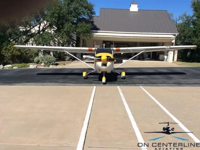 Front view of N8834X Cessna 172 Skyhawk on the tarmac.