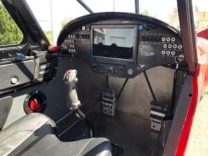 Interior view of the Cubcrafters XCub cockpit, showing the instrument panel and control stick.