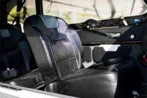 Black leather seats inside the aircraft.