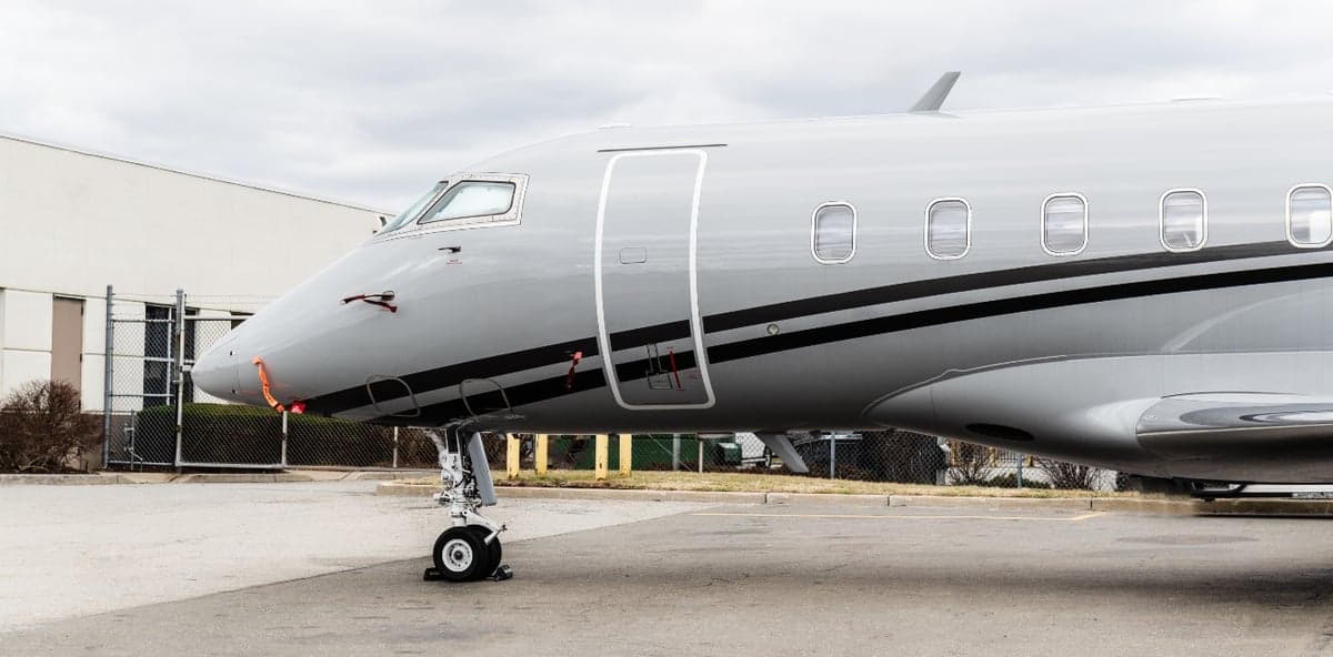 Close up of the nose and entry door of the aircraft.