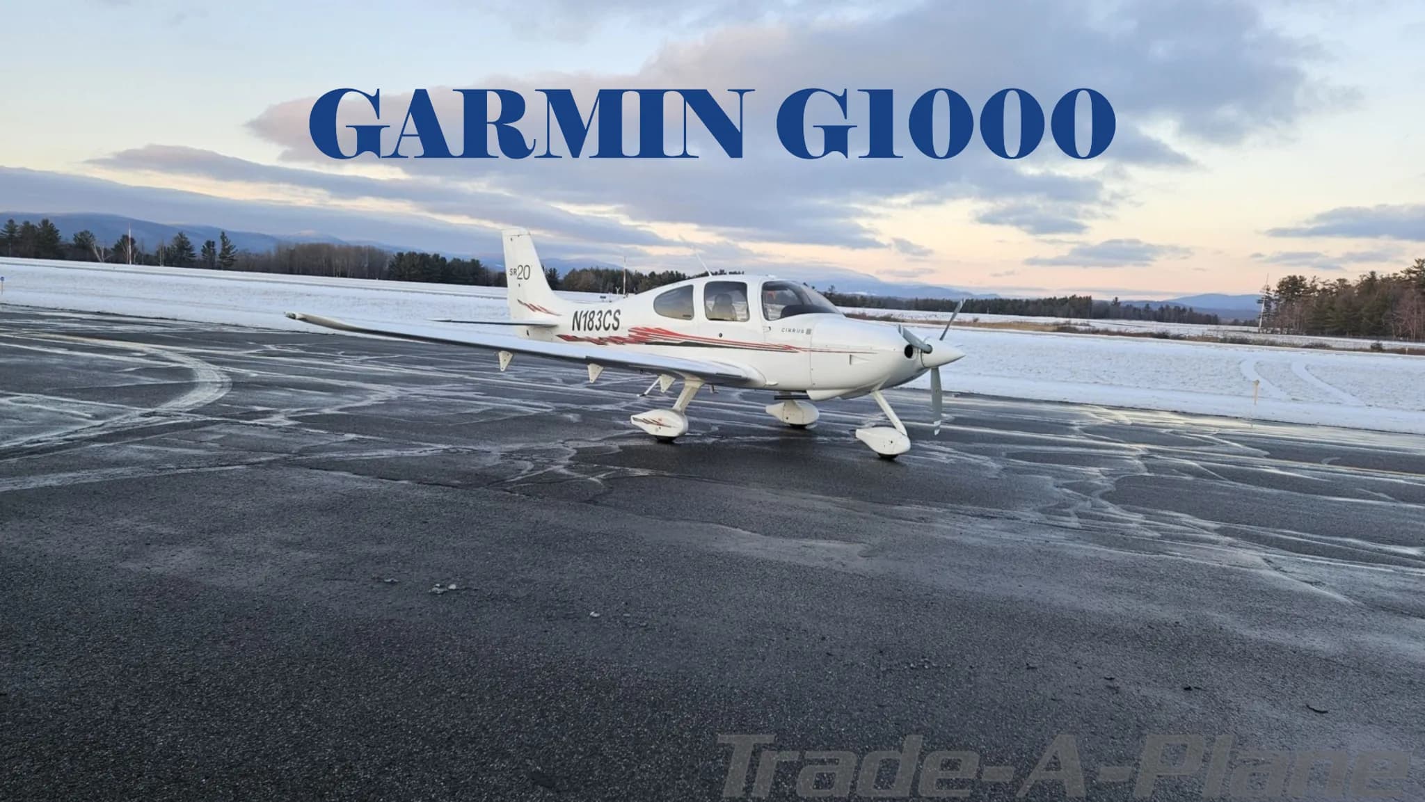 A white Cirrus SR20 aircraft with red and black stripes on a wet tarmac with 'GARMIN G1000' text overlaid.