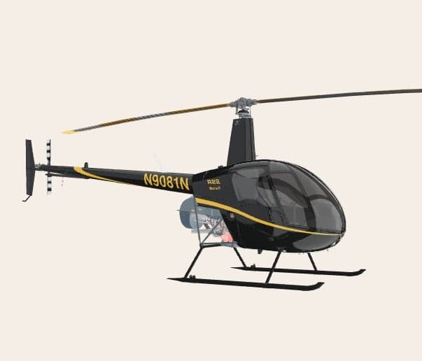 A Robinson R22 helicopter with a black and yellow paint scheme.
