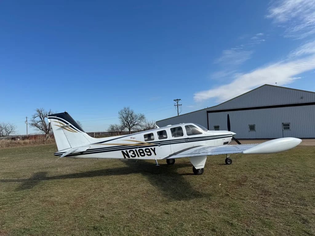 N3189Y Beechcraft Bonanza on the ground with a white and blue paint scheme.