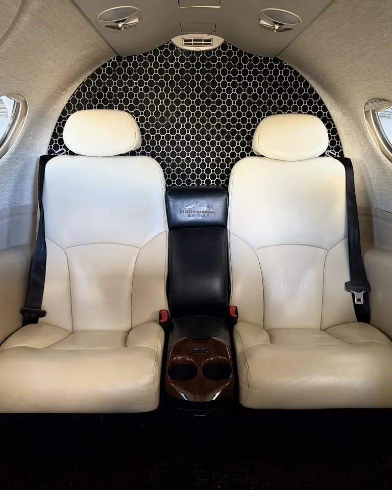 The interior of the Citation Mustang, showing the rear seats and headliner.