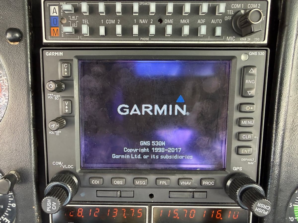 Close-up of the Garmin GNS 530W avionics unit in the aircraft's cockpit.