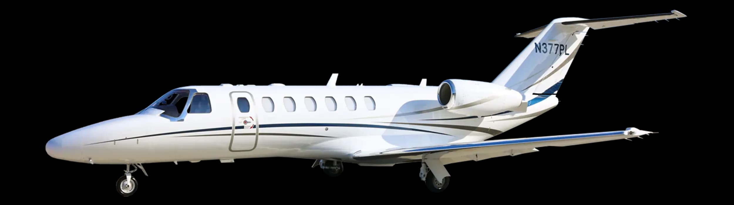 A white Cessna Citation jet with blue and grey stripes, registration N377PL, on a white background.