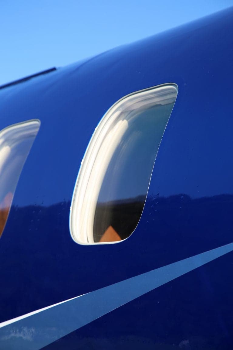 Close-up of the windows on a Pilatus PC-12 NGX.