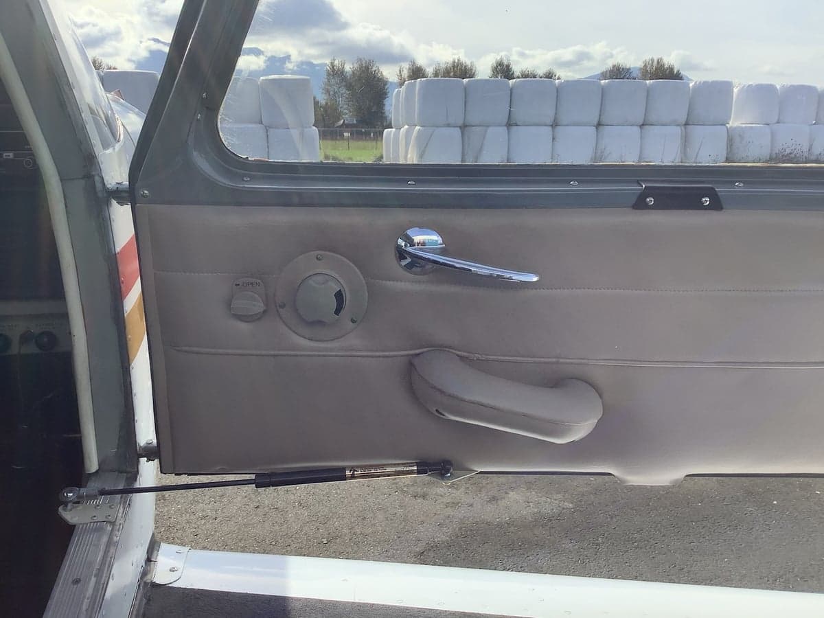 Interior view of the aircraft door and side panel.