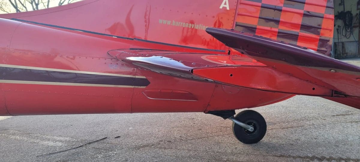 Side view of the Cessna 195 wing and landing gear.