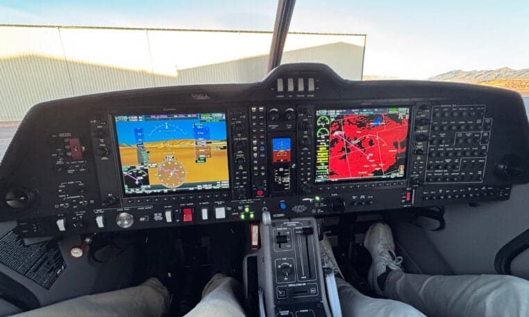 Cockpit view of the Diamond DA50 RG aircraft showing the instrument panel.