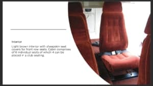 The aircraft's interior with light brown and sheepskin seat covers.