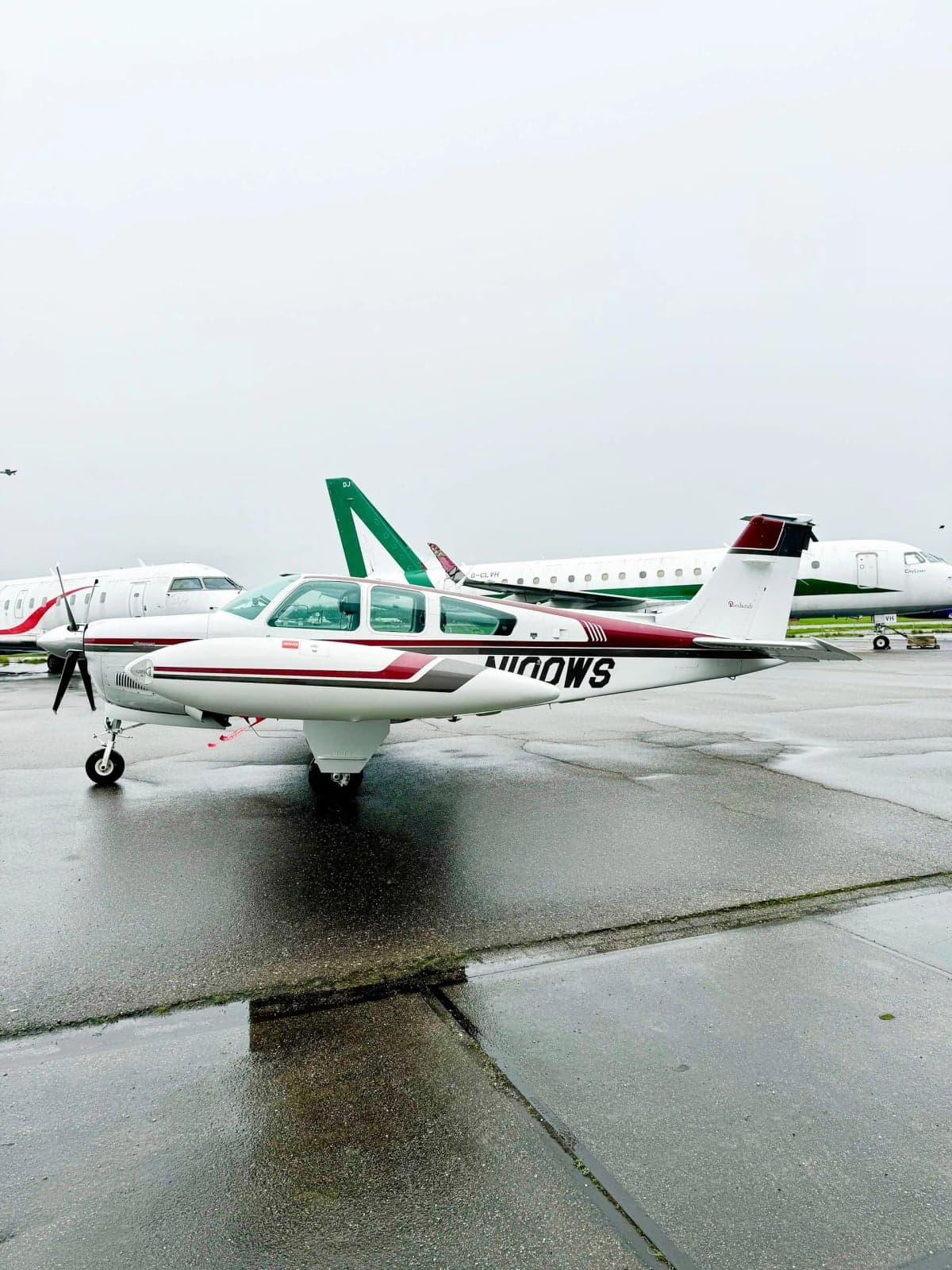 N100WS Bonanza aircraft parked on the tarmac.