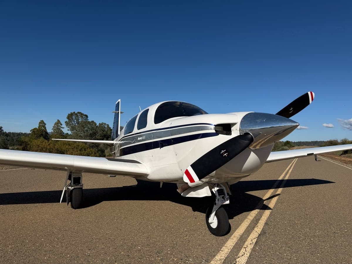 Front view of the Mooney M20J aircraft on the ground.