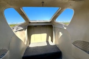 View of the aircraft's interior from the back.