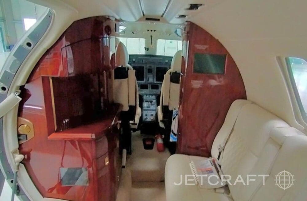 View of the interior cabin looking towards the cockpit.