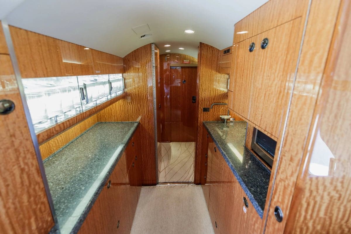A view of the Gulfstream G550 galley showing the countertops and interior design.