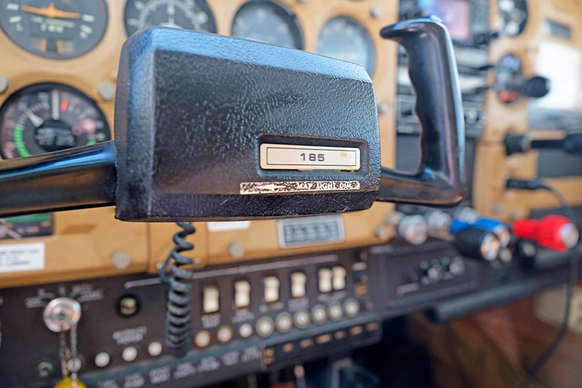 Close-up of the Cessna 206 control yoke and instrument panel.