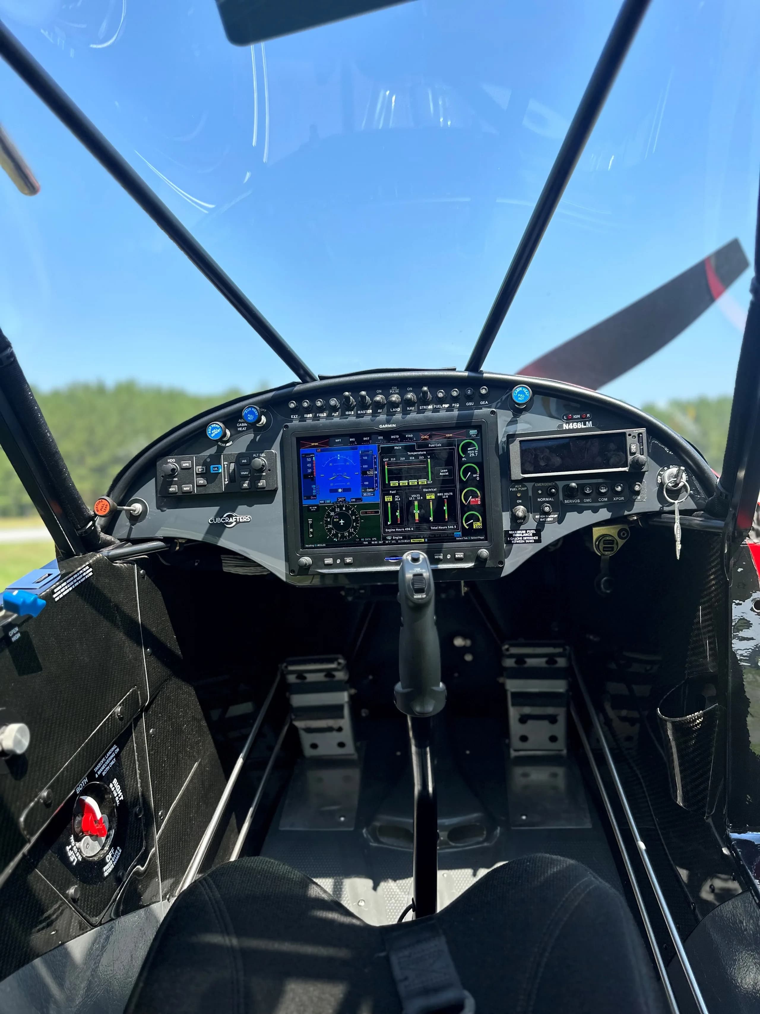 View of the cockpit and instrument panel of the Carbon Cub FX-3.