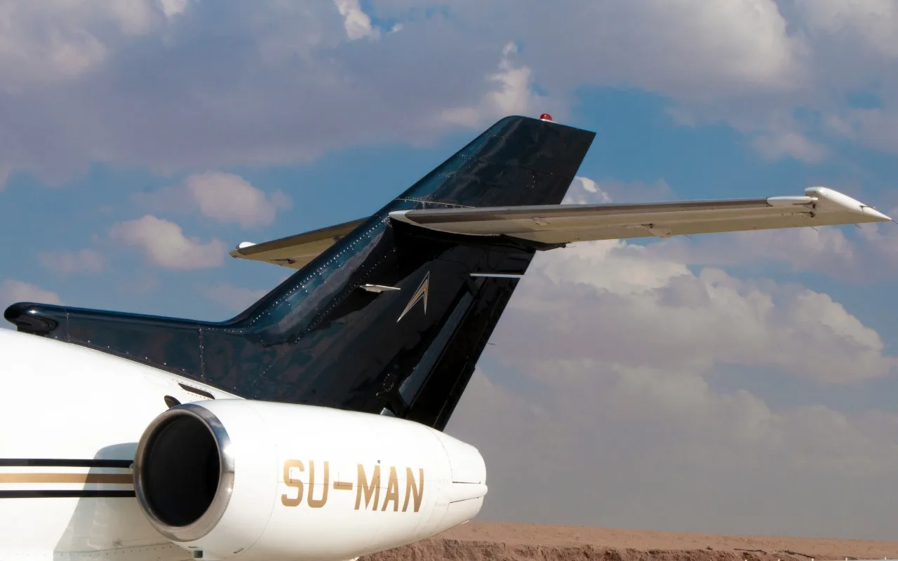 Close-up of the tail of the SU-MAN aircraft, showing the registration number.