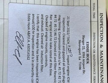 Close-up of aircraft inspection documentation.