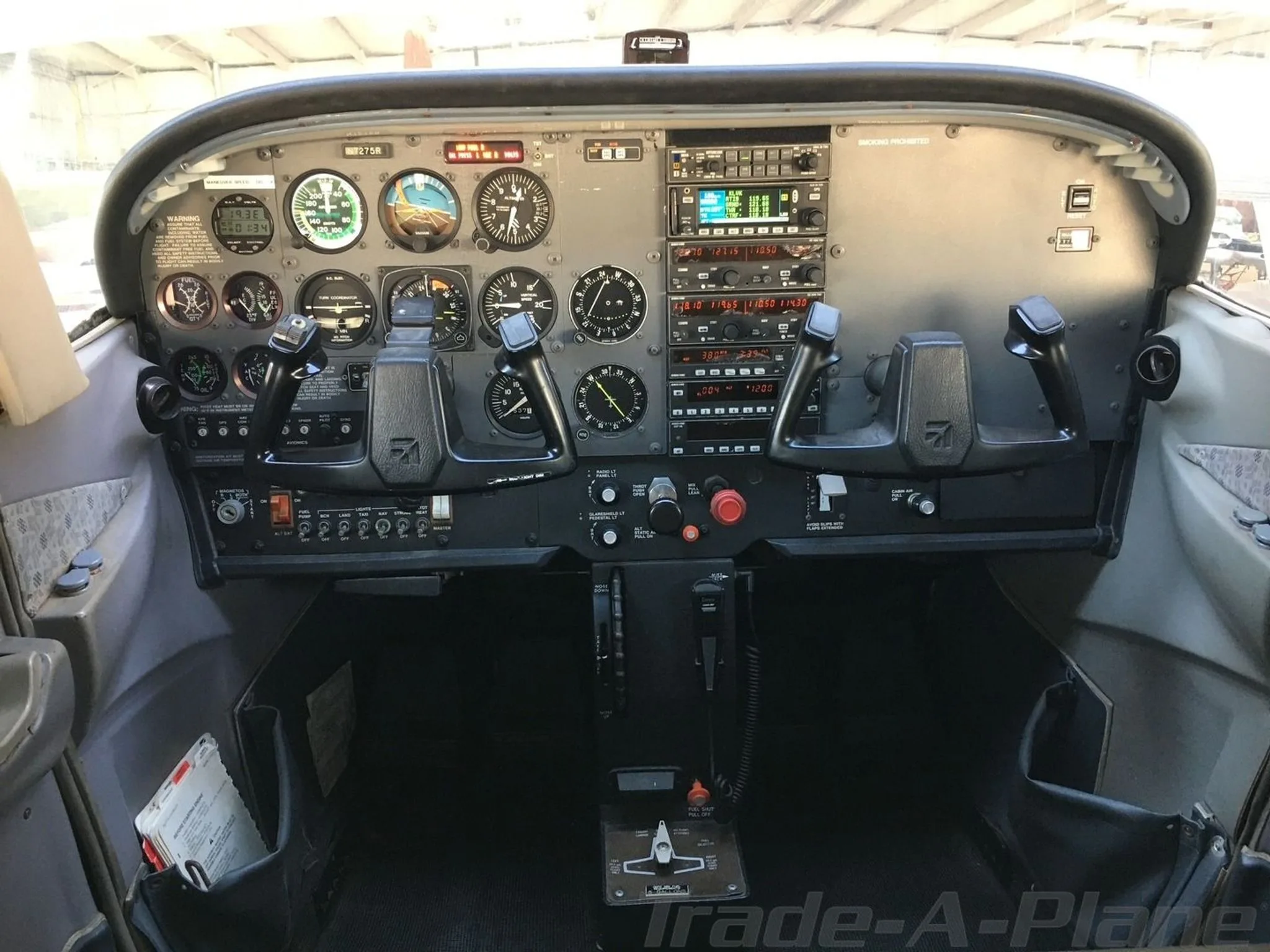 The cockpit of a Cessna 172SP Skyhawk, showing the instrument panel with analog gauges and avionics from a slightly different angle.