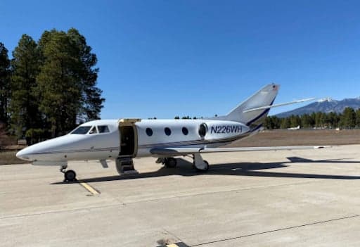 Hawker 400XP aircraft N226WH parked on the tarmac.