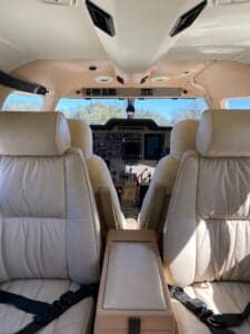 View of the cockpit from the rear seats of the aircraft.