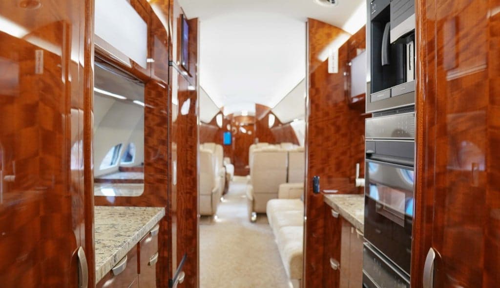 A table and seating area inside the aircraft cabin.
