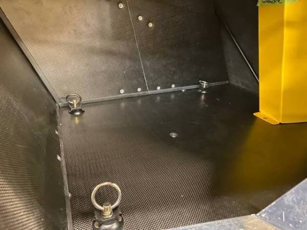 Close-up of the interior of the aircraft's cargo area.