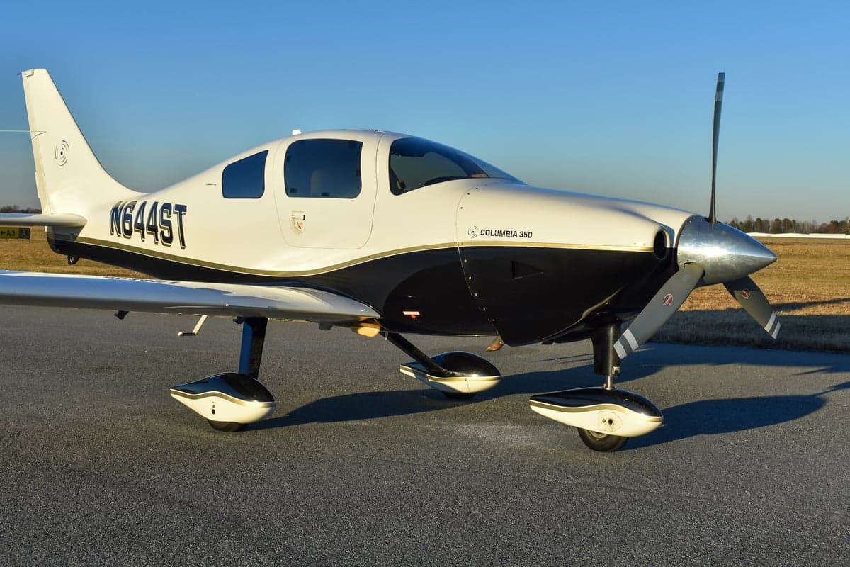 Side view of the Columbia 350 aircraft N644ST on the ground.