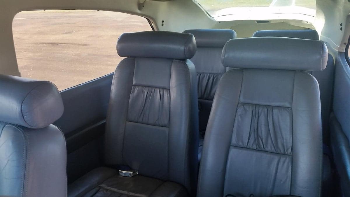 View of the aircraft's gray leather seats.
