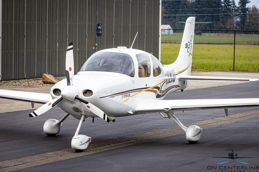 Front quarter view of Cirrus SR22T aircraft N282CD on the tarmac.