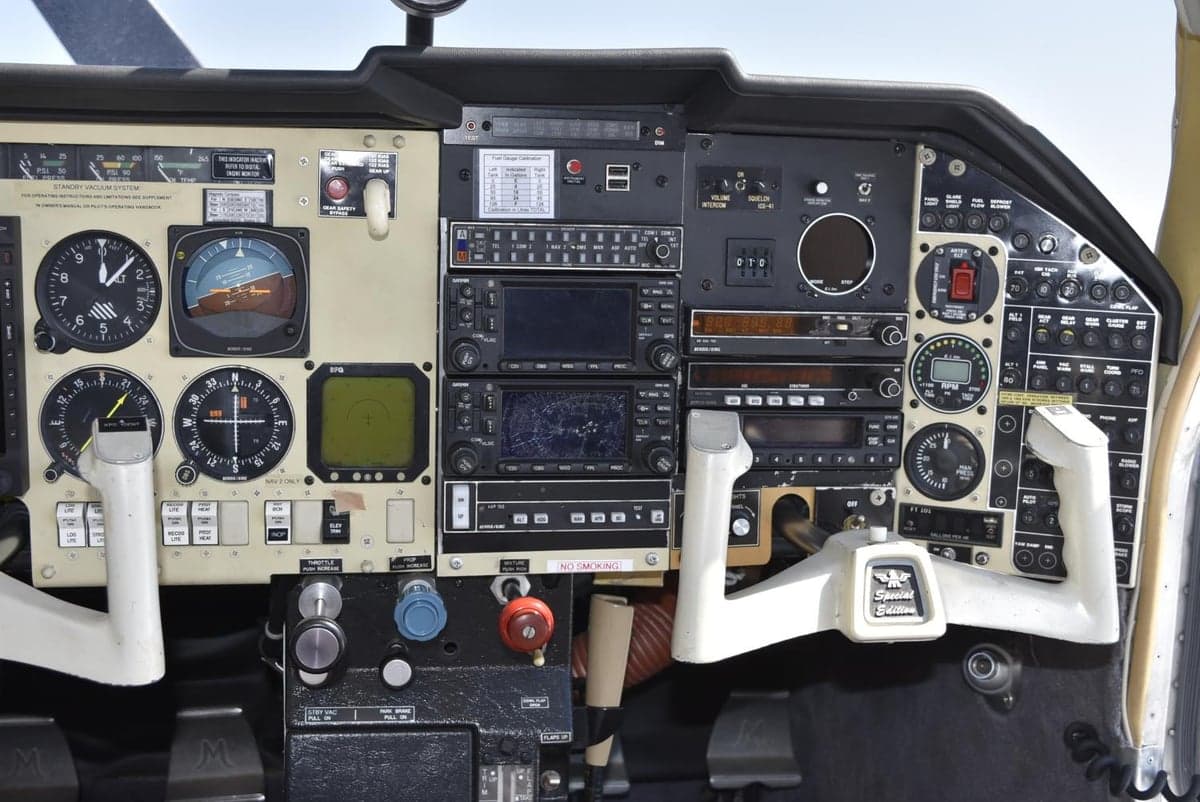 Detailed view of the aircraft's instrument panel and avionics stack.