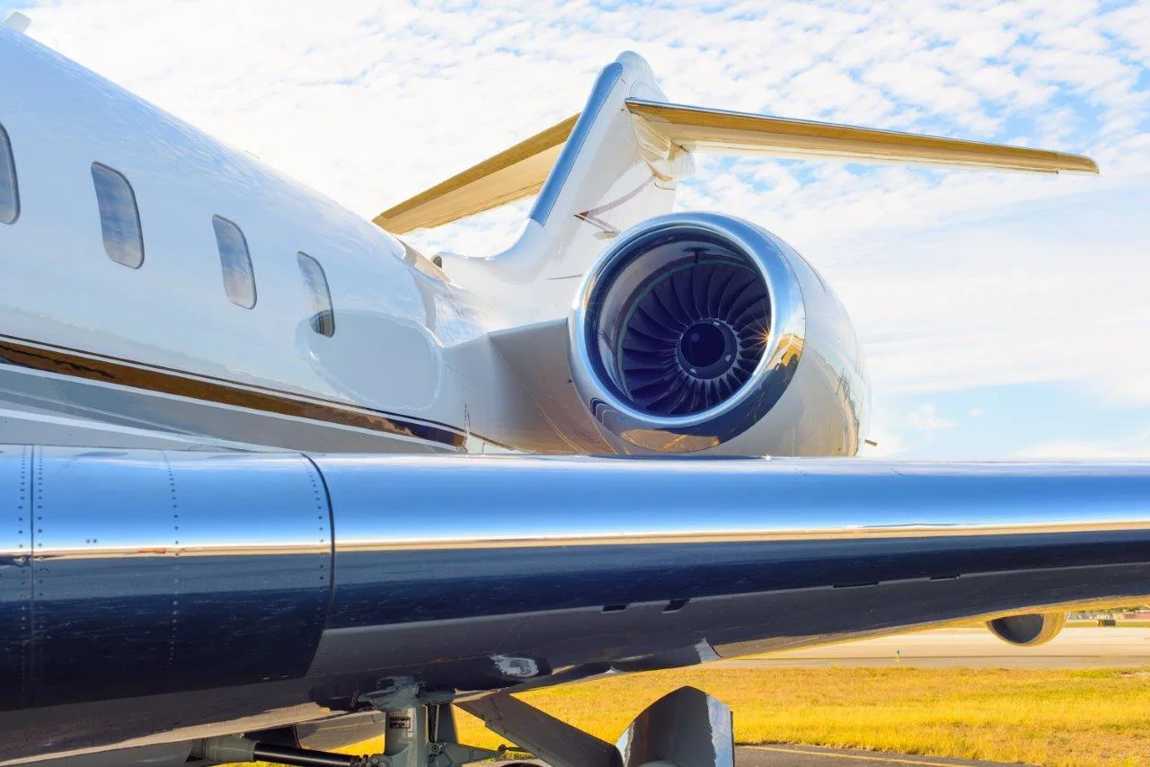 Close up of the tail and engine of a Bombardier Challenger aircraft.
