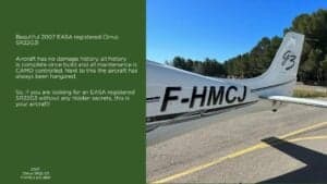 Close-up of the tail of a Cirrus SR22 G3 aircraft with registration F-HMCJ.