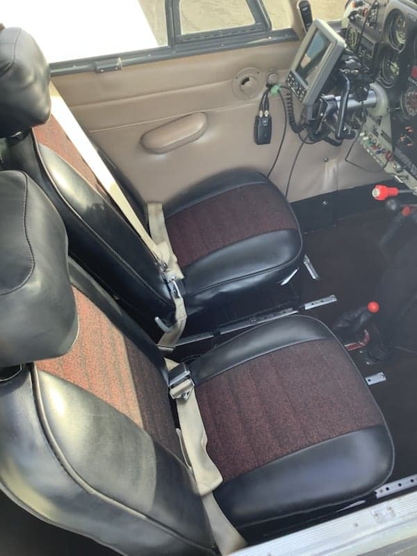 View of the aircraft's front seats and interior.