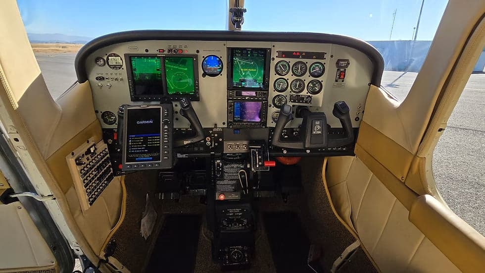 The cockpit features a modern glass panel and avionics suite.