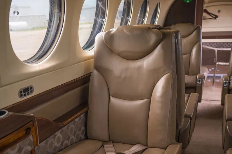 Close-up of the leather seats inside the Beechcraft King Air cabin.