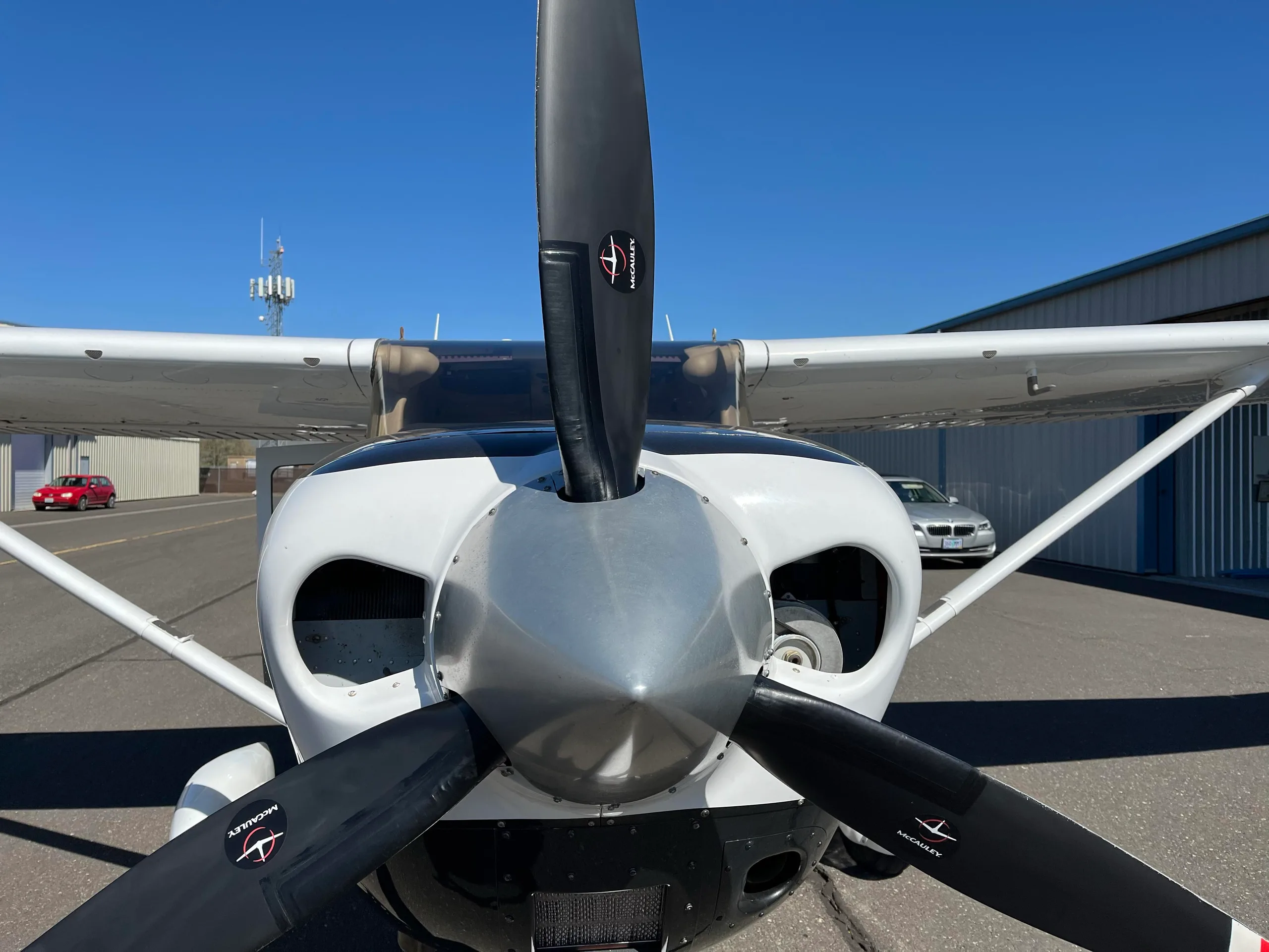 Front view of the Cessna Stationair N993CS showing the propeller and nose.