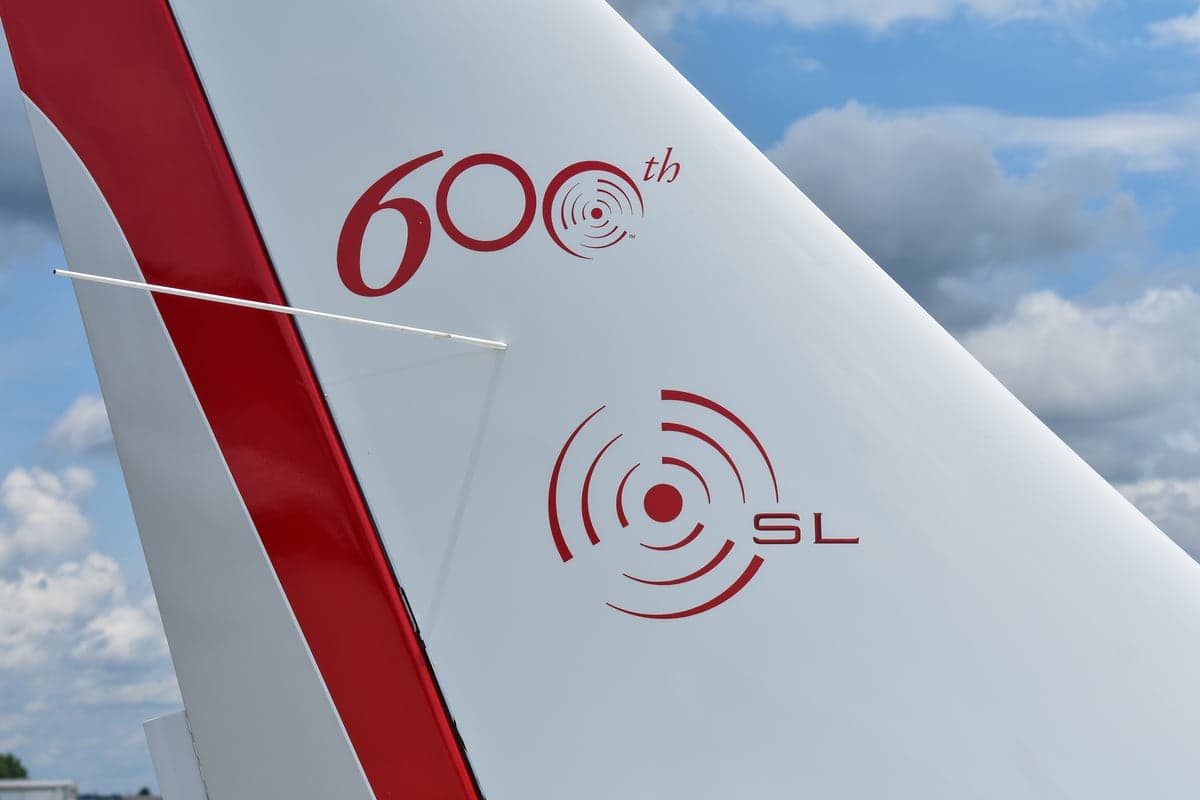Close-up of the tail number N1137A on the aircraft's exterior.