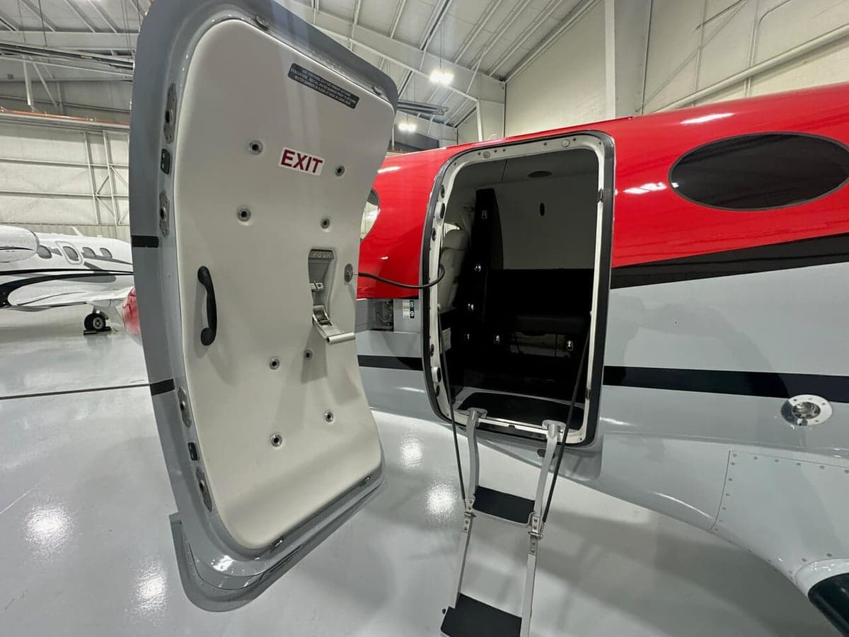 View of the aircraft's open door and entry steps.