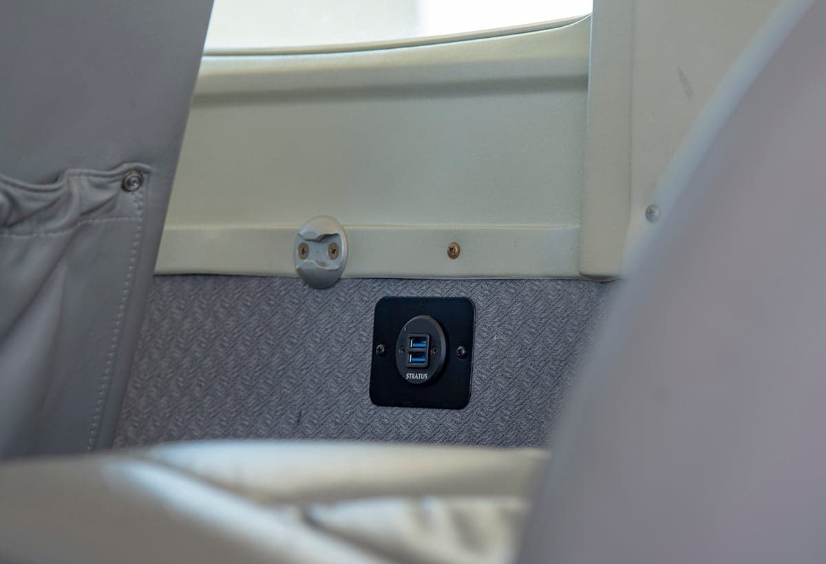 View of the aircraft interior cabin seats.