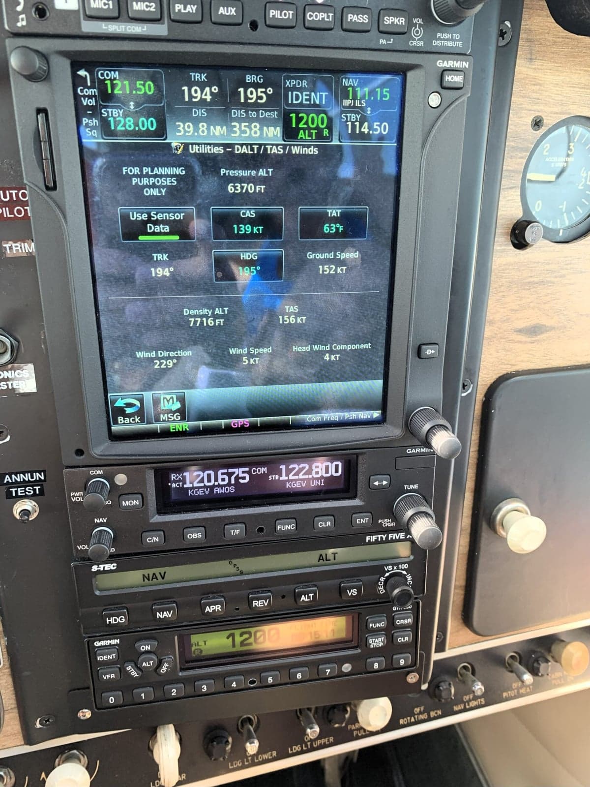 Close-up of the aircraft's avionics stack, including a Garmin GPS unit and other navigation equipment.