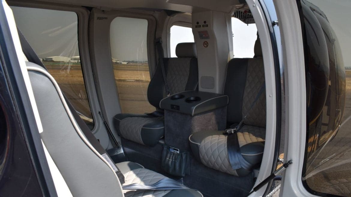 Interior view of the passenger seating in a helicopter.