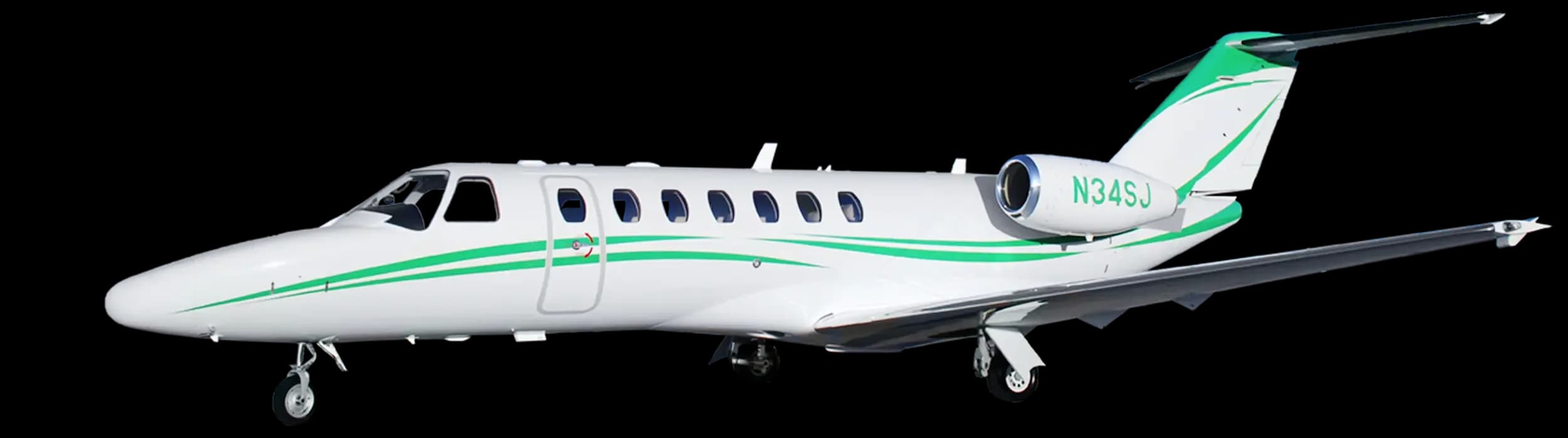 A white Cessna Citation business jet with green stripes and registration N34SJ, viewed from the front-right side.